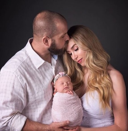 Jon Dorenbos and his wife Annalise Dale with their daughter Amaya Love